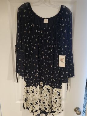 Siren Lily Navy Blue Garment with Orange Logo Tag